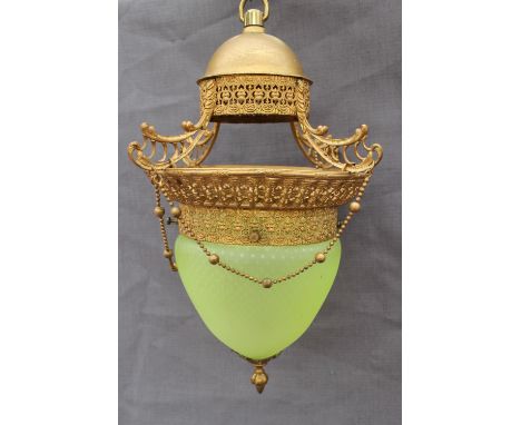 A Victorian green glass and gilt metal hanging light, with pierced decoration, 33cm high 