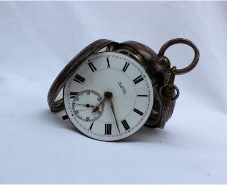 An Edward VII silver open faced key wound pocket watch, the enamel dial with Roman numerals and a seconds subsidiary dial ins