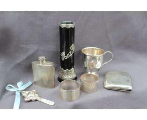 A George V silver hip flask, with engine turned decoration, Birmingham, 1938, together with a pair of silver napkin rings, si