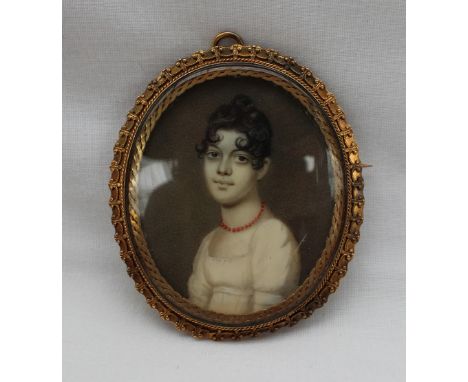 19th century British SchoolHead and shoulders portrait of a young ladyA miniature 5.5 x 4.5cmIn a gilt metal pendant / brooch