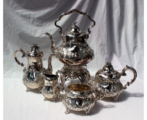 A Victorian silver four piece teaset, comprising hot water pot, teapot, sugar basin and cream jug, with chrysanthemum finials