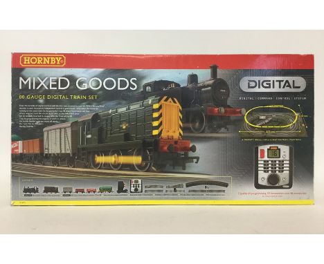 HORNBY: An 00 gauge "Mixed Goods" Digital Train set numbered R 1075. Est. £30 - £50.