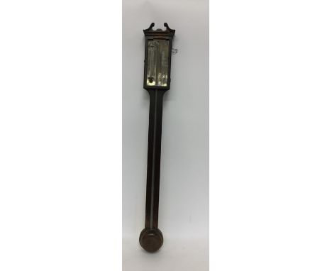 A mahogany stick barometer with silvered dial. By E Ronchetti, Exeter. Est. £60 - £80.