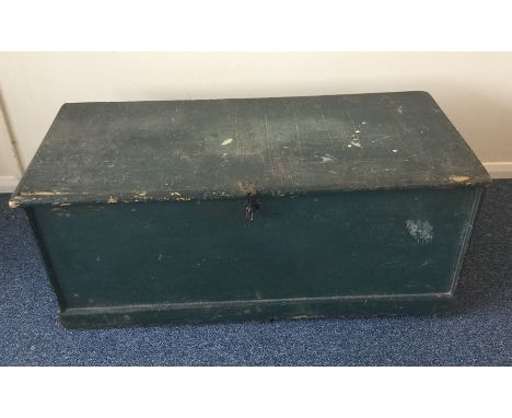 A painted pine trunk with hinged top. Est. £30 - £40.