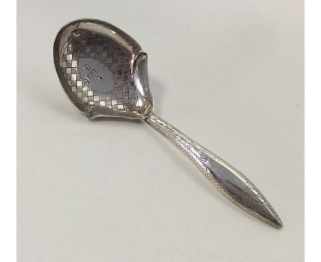 A good Victorian bright cut silver caddy spoon. Birmingham. By WP. Approx. 9 grams. Est. £50 - £80.