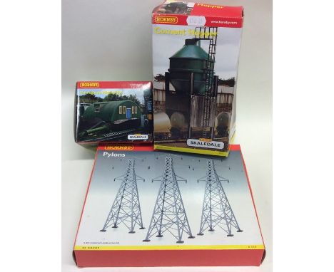 HORNBY: A boxed cement hopper numbered R8711 together with a tin shed numbered R8788 and three pylons numbered R530. (3). Est