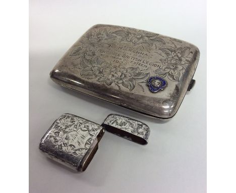 A heavy silver enamel decorated cigarette box together with a vesta case. Approx. 150 grams. Est. £40 - £60.