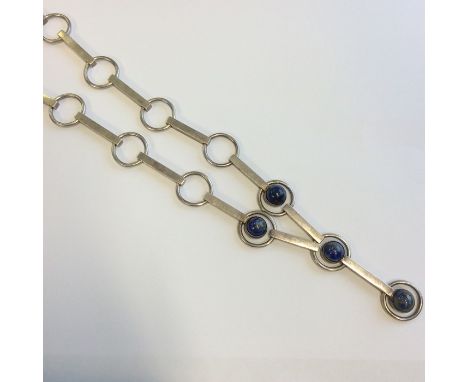 A good stylish silver and lapis necklace with ring clasp. Approx. 77 grams. Est. £300 - £400.