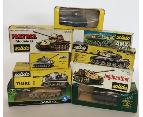 SOLIDO: A box containing nine various die-cast model tanks in boxes. (9). Est. £30 - £50.