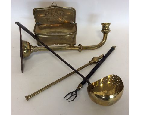A small Antique brass box together with a toasting fork, ladle, lamp etc. Est. £20 - £30.