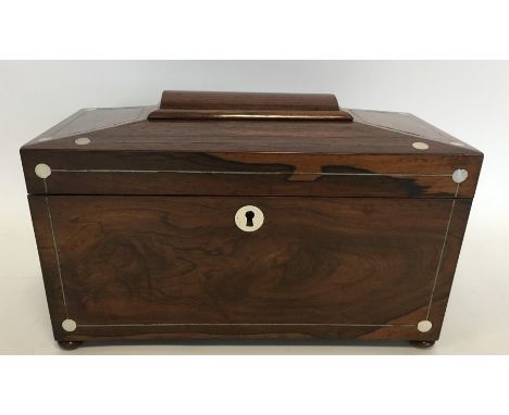 A good rosewood and MOP tea caddy with fitted interior. Est. £50 - £80.