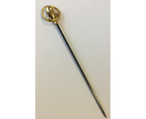 CHARLES HORNER: A small gold mounted stick pin. Approx. 2 grams. Est. £20 - £30.