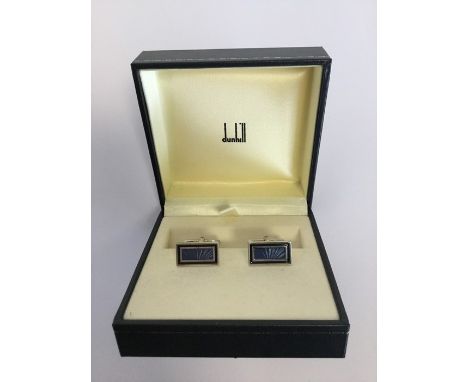 A boxed pair of Dunhill cufflinks decorated with enamel. Est. £20 - £30.