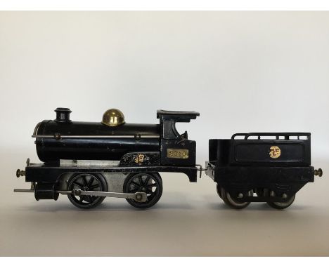 MECCANO LTD: An 0 gauge black livery unboxed scale model steam engine and trailer numbered 2710. Est. £30 - £50.