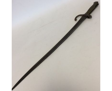 An old bayonet, numbered R 23185. Est. £30 - £40.