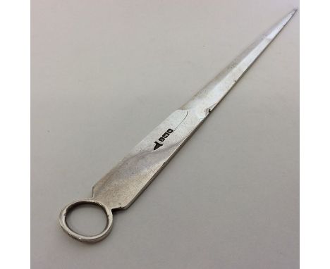 A silver meat skewer with ring thumb piece. Sheffield. Approx. 54 grams. Est. £45 - £55.