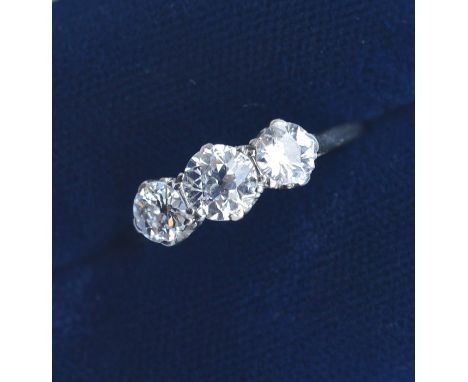 A good diamond ring, the three brilliant cut stones attractively mounted in platinum setting on plain band. Est. £2500 - £300