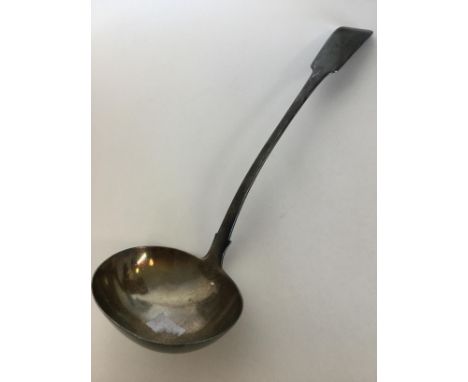 A good Irish silver fiddle pattern and rat tail soup ladle with crested armorial. Approx. 270 grams. Est. £150 - £200.