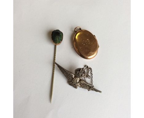 A scarab stick pin, a 9 carat mounted locket and a silver brooch. Est. £15 - £20.