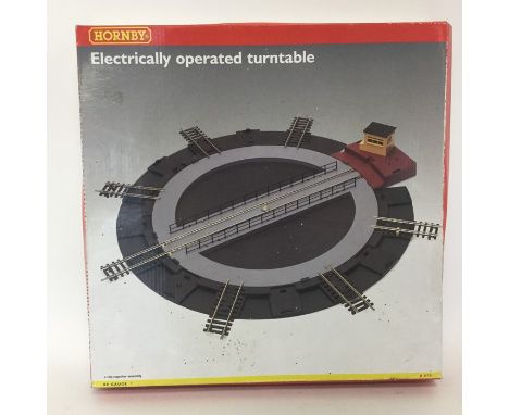 HORNBY: An 00 gauge boxed scale model Electrically operated turntable. Est. £20 - £30.