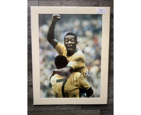 Pele Signed Brazil Football Print: In mount measuring 27 x 20 inches with COA from leading dealer A1 Sporting Memorabilia. De