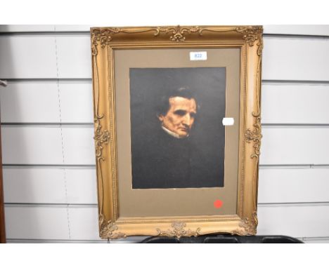 A vintage print in an ornate frame