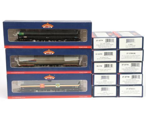 Bachmann 00 Gauge group of Tankers consisting of Bogie tankers 38-113 Esso grey, 38-221 Shell/BP Black, 38-222 Amoco Black, 3
