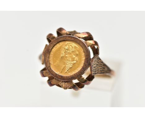 A 9CT YELLOW GOLD COIN RING WITH MEXICAN COIN, the ring set with a Mexican Maximiliano coin, dated 1865, to the open work gal