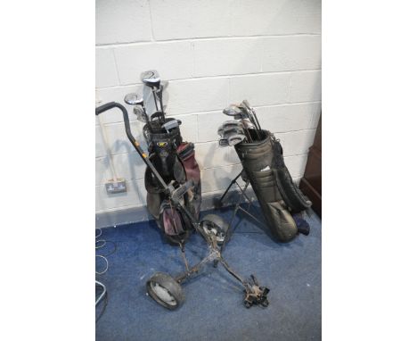 A COLLECTION OF GOLFING EQUIPMENT to include two golf bags containing Golden Bear, Ikarus, Silver Knight, Callaway clubs and 