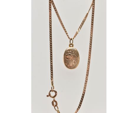 A 9CT GOLD LOCKET PENDANT NECKLACE, the locket of an oval form decorated with an engraved floral pattern to the front, polish