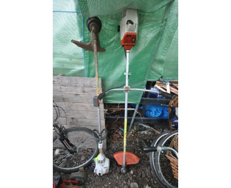 A STIHL FS56RC PETROL STRIMMER (starts and runs) and a Stihl FS44 petrol strimmer (engine pulls freely but hasn't started)