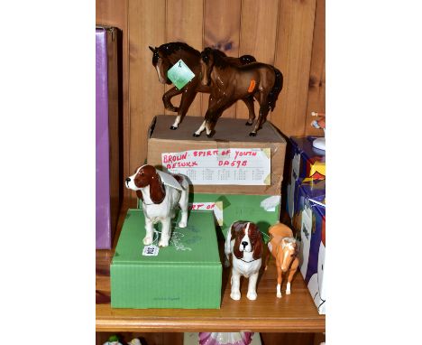 A GROUP OF BESWICK AND ROYAL DOULTON HORSES AND DOGS, comprising a boxed brown Beswick Spirit of Freedom model no 2689, a bro