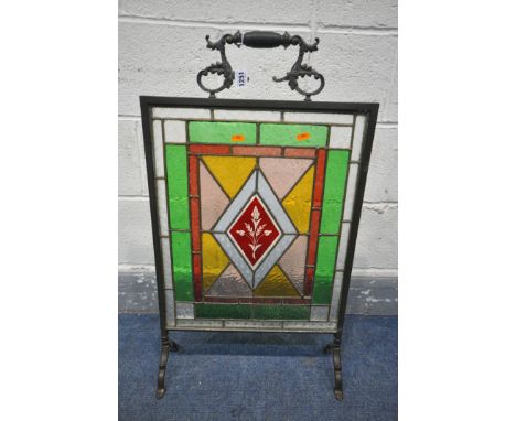 AN EARLY 20TH CENTURY ART NOUVEAU COLOURED LEAD GLASS FIRE SCREEN, 46cm x height 80cm (condition:-good condition, apart from 