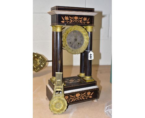 A BLACK EBONISED PORTICO CLOCK, with inlaid floral decoration and banding, the dial having Roman numerals, obscured signature