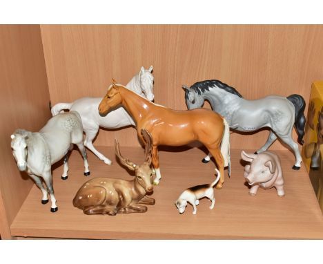 A GROUP OF BESWICK HORSES AND OTHER ANIMALS, comprising a palomino Imperial model no 1557, a grey Arab 'Bahram' no 1771 (miss