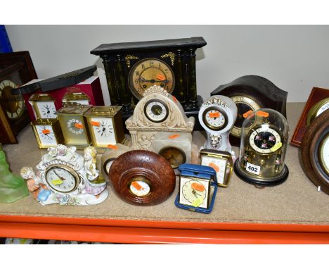 A QUANTITY OF CLOCKS, comprising a Ron Coles native Australian Red Burl wood mantel clock, a wooden cased Smith's mantel cloc