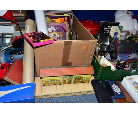 FIVE BOXES OF ASSORTED HOUSEHOLD SUNDRIES, to include a Hornby No.3 tin Train Station, cutlery, a boxed cake slice and carvin