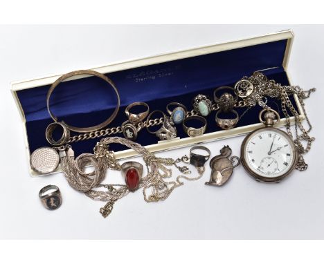 AN ASSORTMENT OF SILVER AND WHITE METAL JEWELLERY, to include a silver buckle ring, a silver cat brooch, a silver and carneli