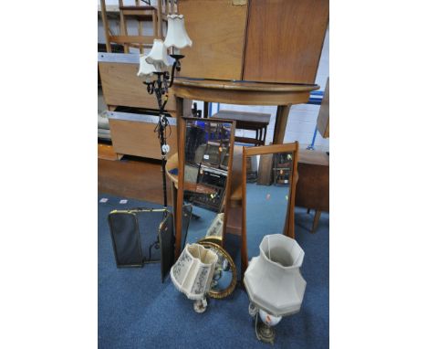 TWO MID CENTURY TEAK RECTANGULAR WALL MIRRORS, 125cm x 29cm, a circular gilt wall mirror, a wrought iron triple standard lamp