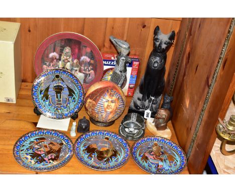 A GROUP OF EGYPTIAN THEMED ORNAMENTS AND CABINET PLATES, comprising four Royal Worcester Legends Of The Nile series plates 'T