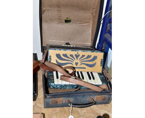 A VISSIMIO ACCORDION, with 'Piano Action' in original case (1) (Condition report: leather straps are worn, front panel loose,