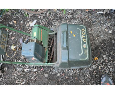 AN ATCO COMMODORE B14 PETROL CYLINDER MOWER with grass box (engine pulls freely but hasn't started)