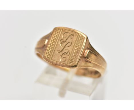 A 9CT GOLD SIGNET RING, of a square form with engraved initials and engine turned pattern, textured shoulders leading onto a 