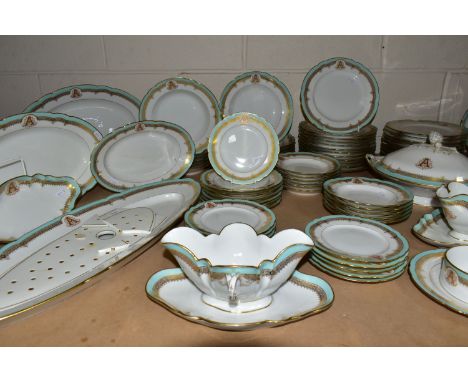 A LATE NINETEENTH CENTURY FRENCH PORCELAIN MONOGRAMMED DINNER AND DESSERT SERVICE, monogrammed with the letter A, having a pa
