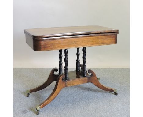 A Regency mahogany, cut brass and rosewood crossbanded D shaped folding card table, 94cm