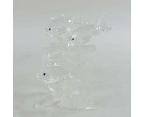 A Swarovski crystal model of a shoal of fish, 10cm tall, boxed 