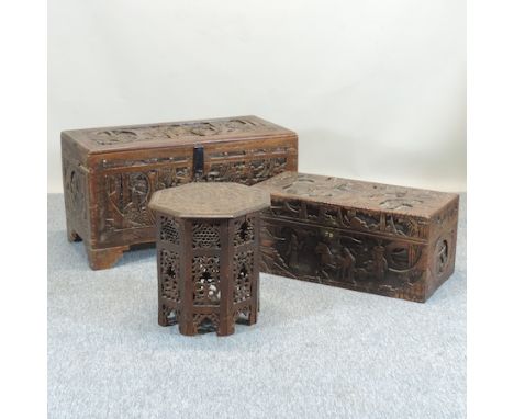 An early 20th century Chinese carved hardwood trunk, together with another and an Indian occasional table, 41cm 