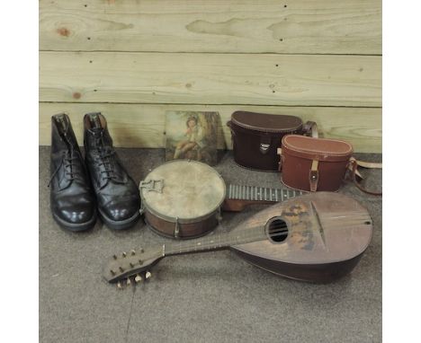 An early 20th century banjo, together with a lute, a miniature oil on board and a pair of air wear boots