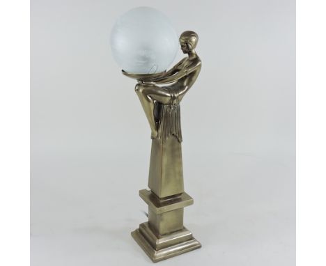 An Art Deco style, figural table lamp with a white glass shade, 50cm tall 