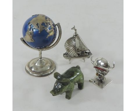 A collection of silver items to include a miniature globe, 8cm tall, together with a jade figure of a pig